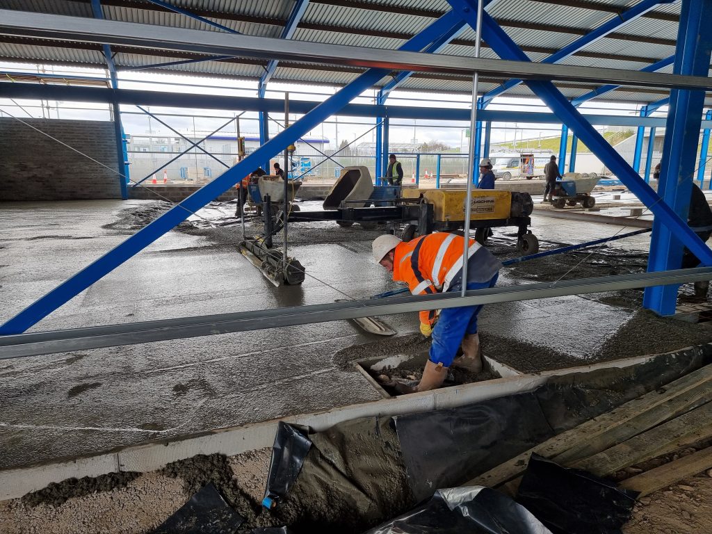 Floor poured at new AJE development