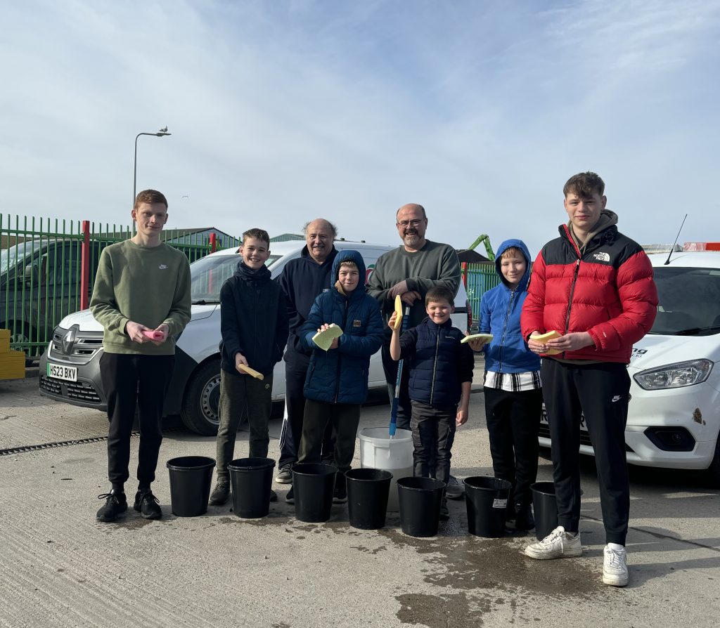 Vehicle wash helps fund London trip