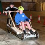 Scouts inspired by firm’s carty races