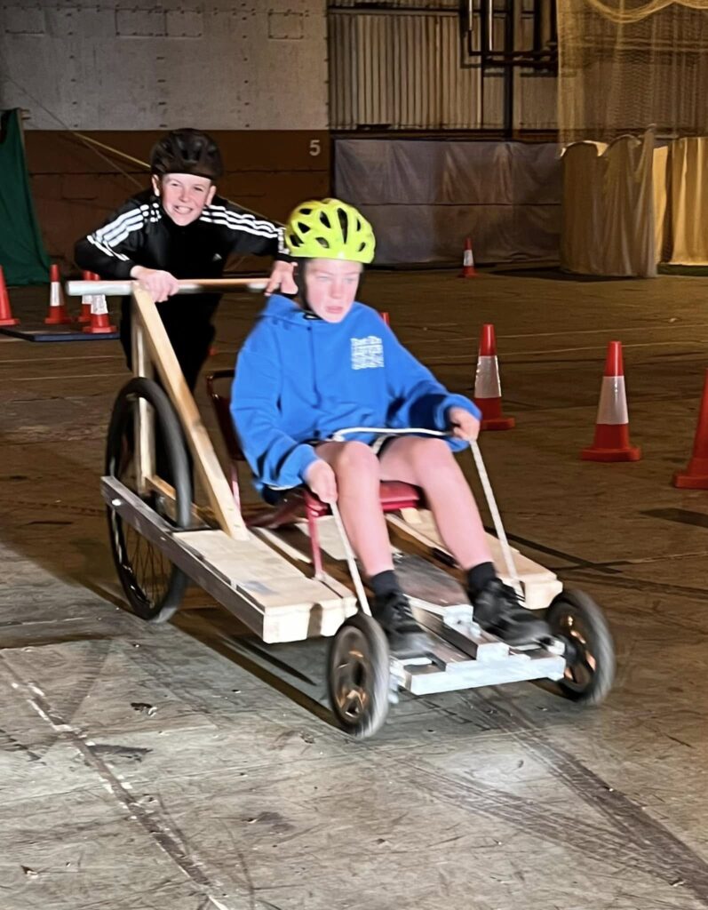 Scouts inspired by firm’s carty races